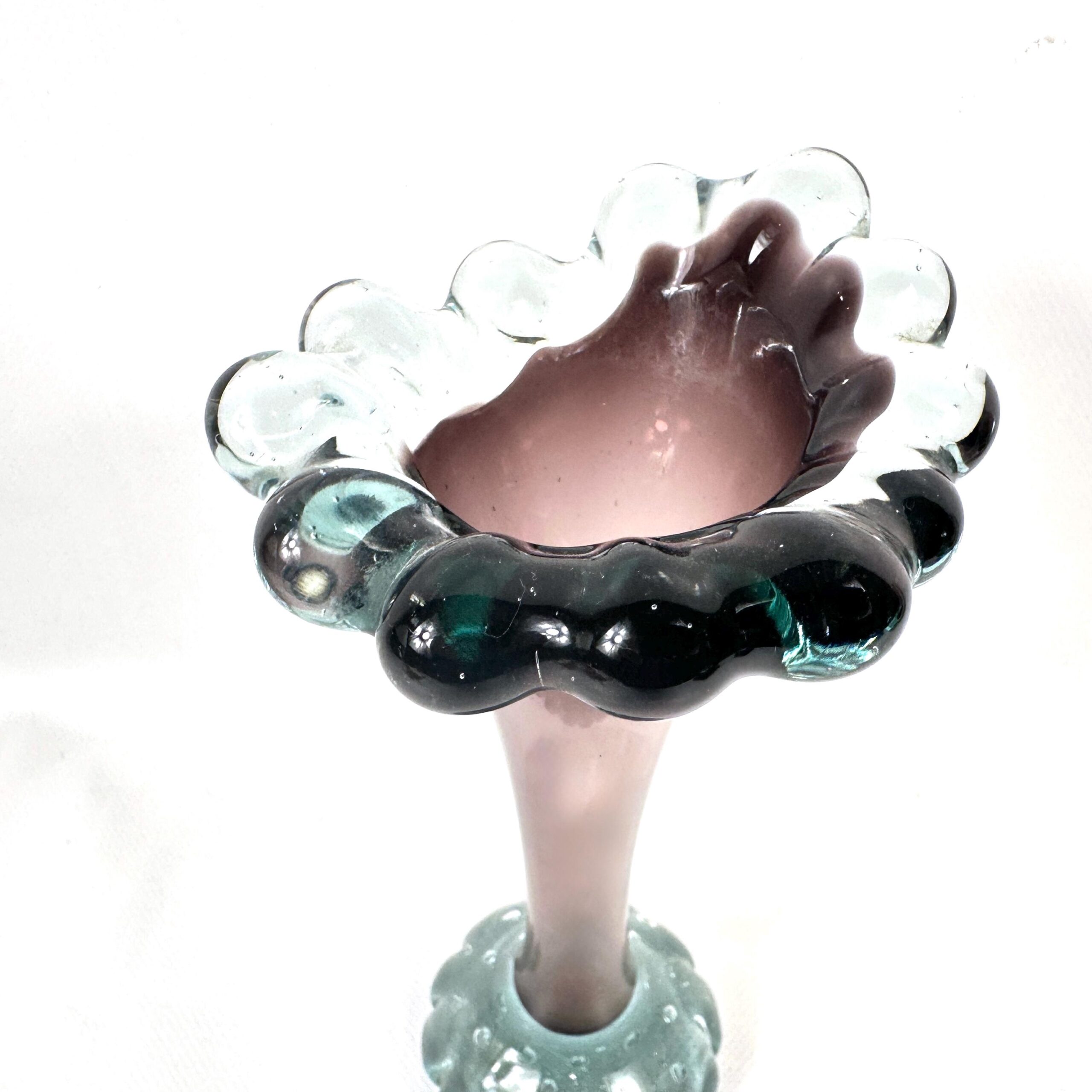 Overhead shot of bubble rim showing mixed glass spheres and open cavity