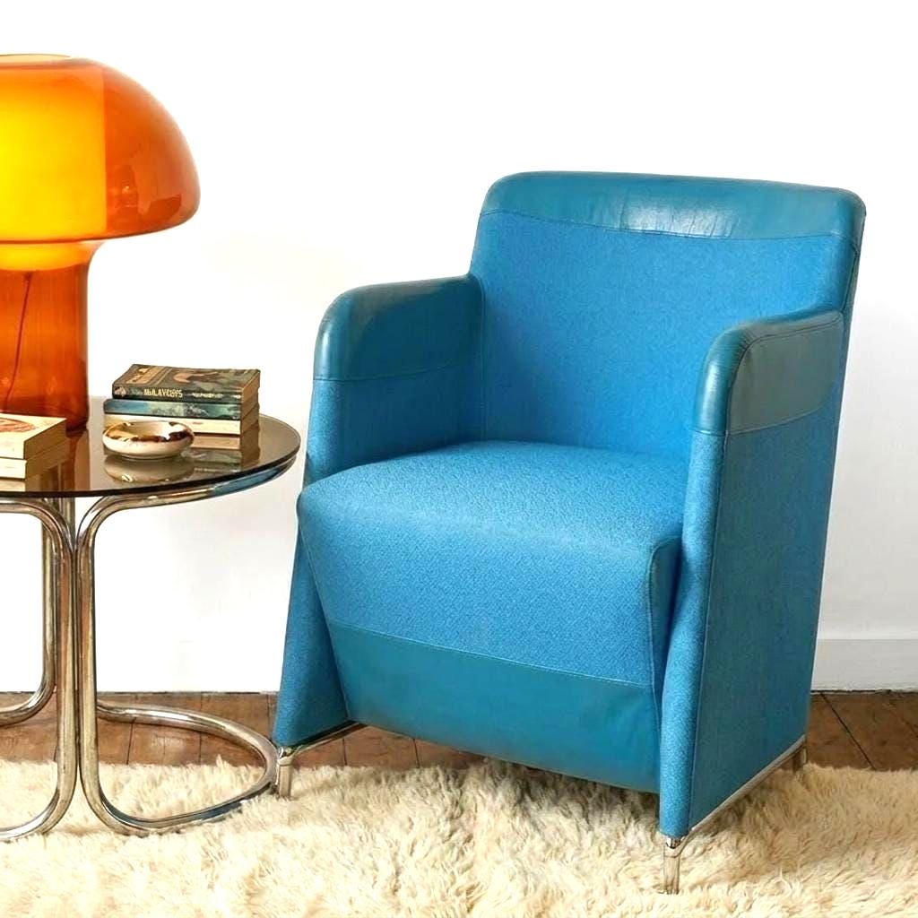 Solo armchair by Lindau & Lindekrantz, blue fabric and leather upholstery, chrome base, displayed in styled interior setting