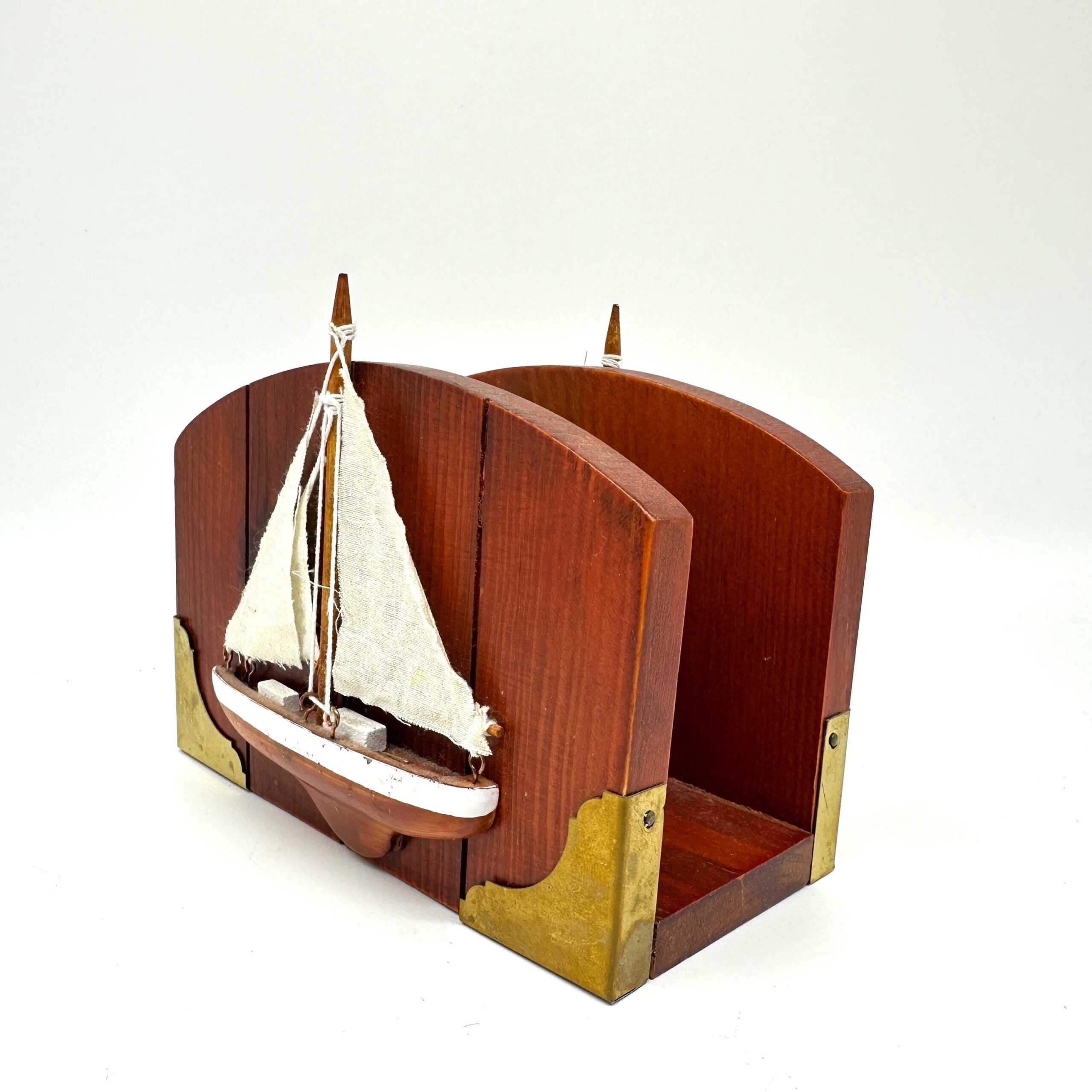 Vintage wooden sailboat letter holder with cream canvas sails, mahogany curved body, brass corner brackets, three-dimensional