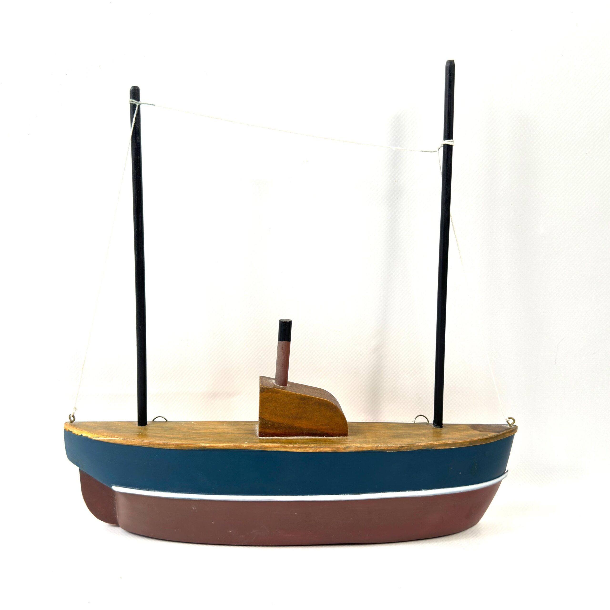 Wooden half-hull boat model with blue stripe, burgundy base, black rigging masts, neutral background