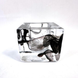 Kosta Boda black ice glass brick votive by Anna Ehrner, square form with embedded organic motifs, front three-quarter view