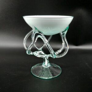 White and green hand-blown Polish glass jellyfish vase with sculptural tentacle base, three-quarter front view