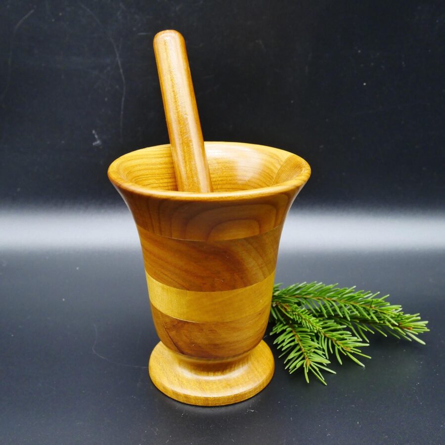 A handcrafted Swedish farmhouse essential from the 1970s. Warm wood grain and timeless design bring authentic vintage character to any kitchen. Swedish wooden pestle and mortar set from 1970s, honey-toned wood with visible grain, featuring cylindrical handle and pedest
