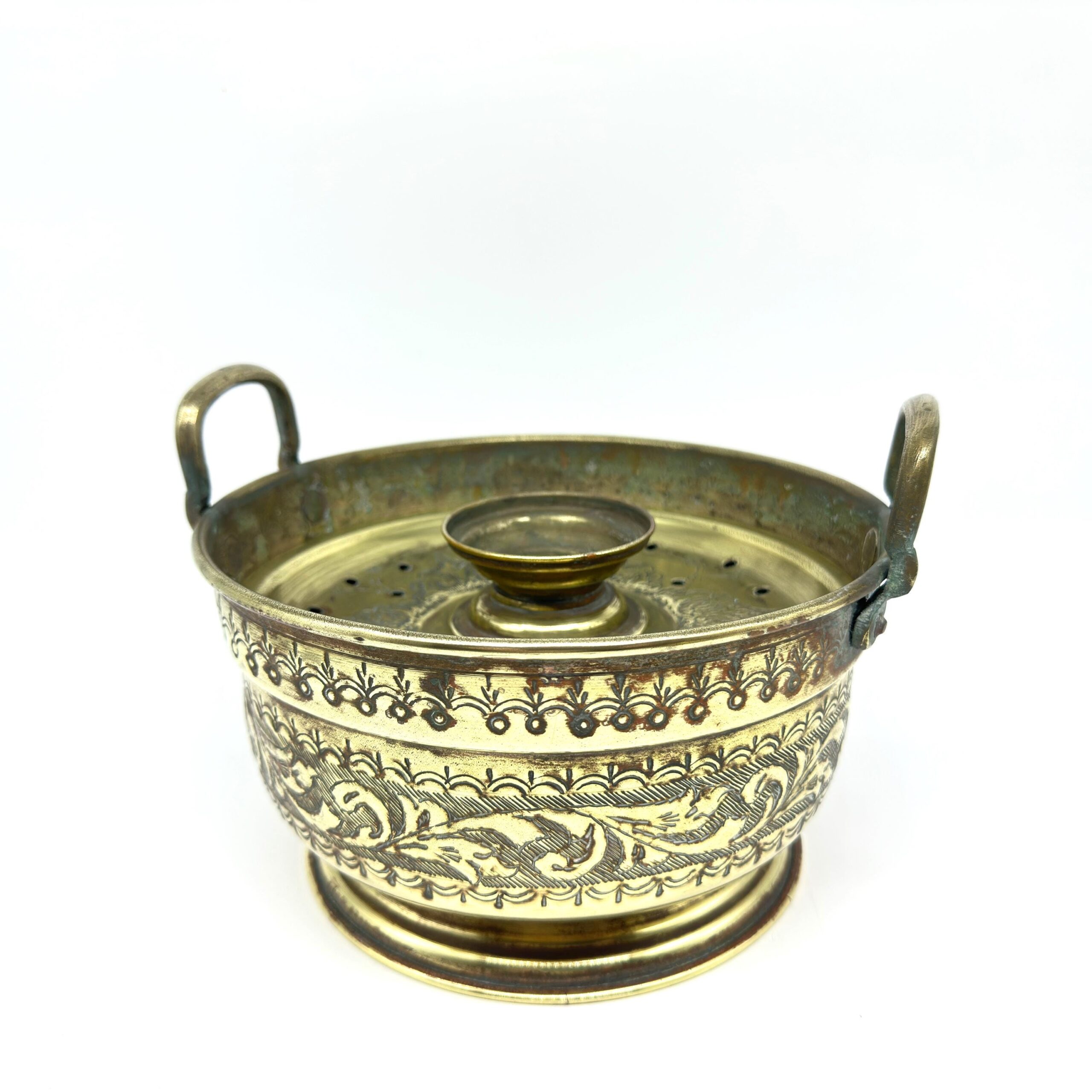Brass basin alone displayed with handles visible, showing engraved ornamental bands and aged golden patina throughout
