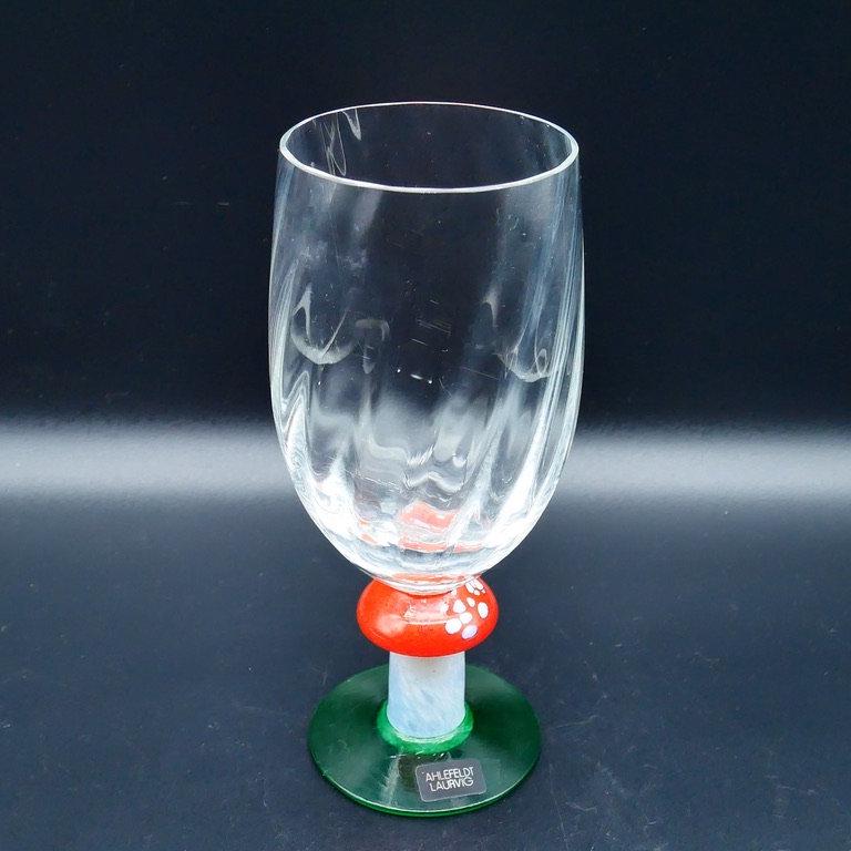 Crystal champagne flute portrait showing full height, transparent bowl, and complete stem-to-base construction