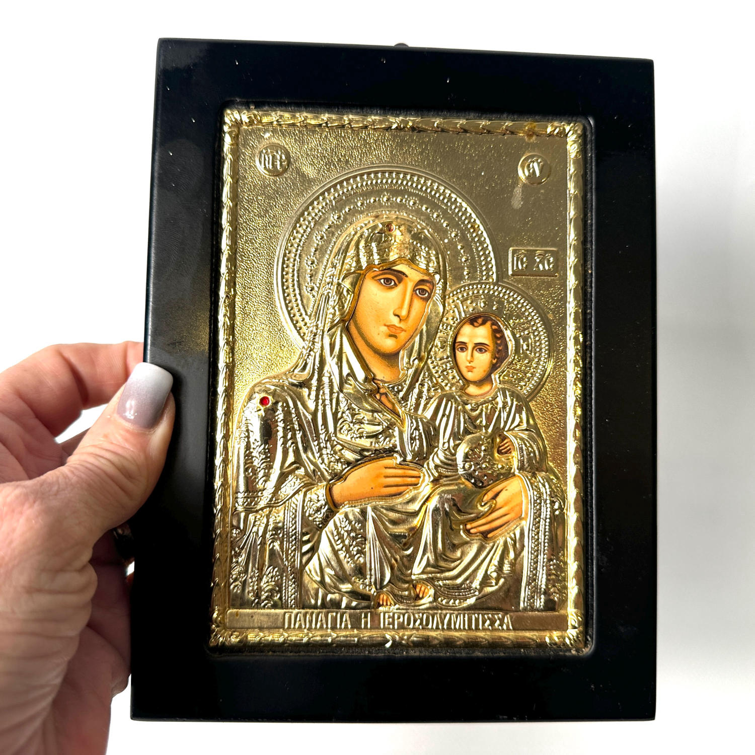 Greek Orthodox icon Virgin Mary and Christ Child, silver-plated Byzantine religious plaque on black backing panel, hand-finis