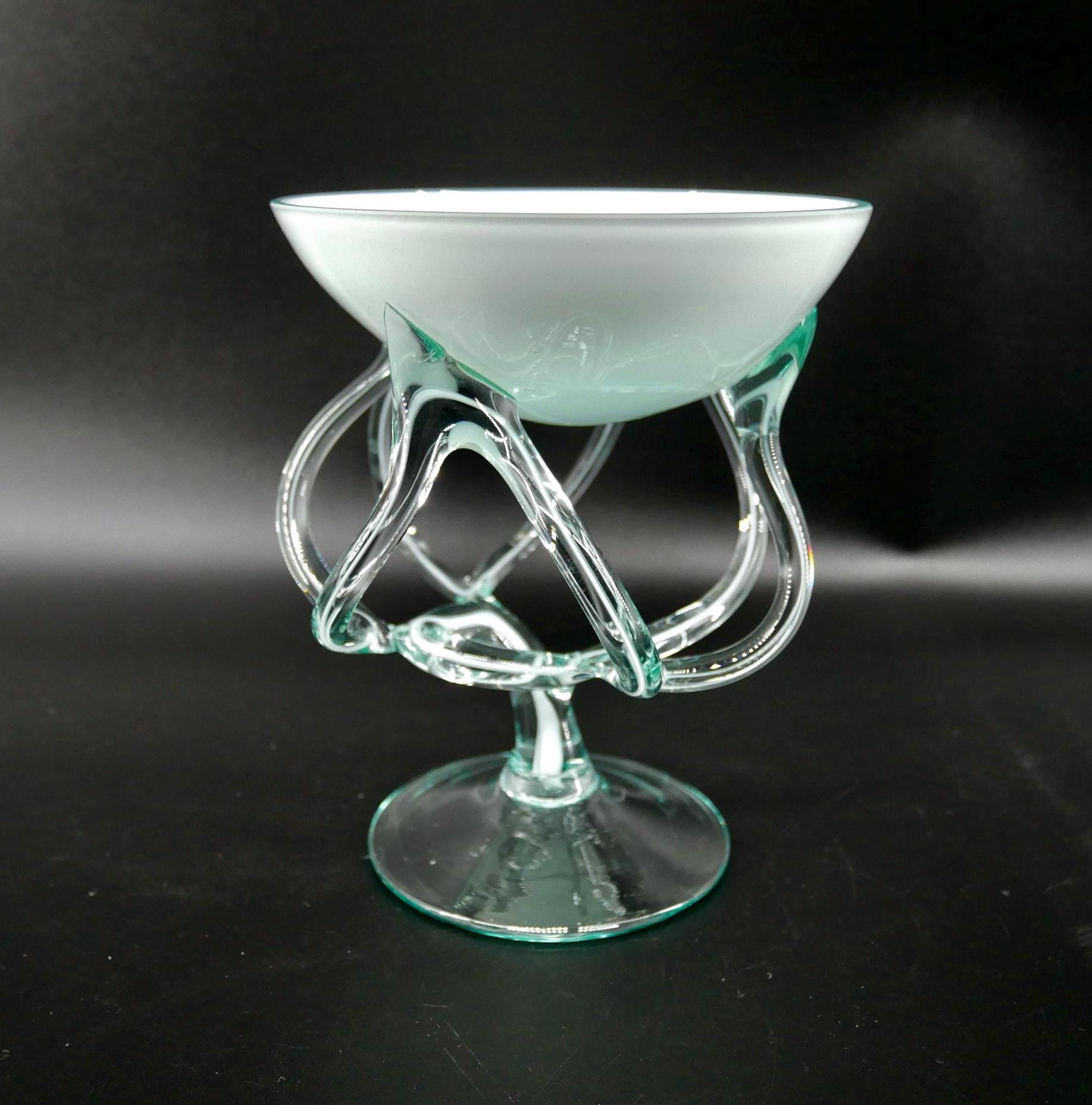 White and green hand-blown Polish glass jellyfish vase with sculptural tentacle base, three-quarter front view