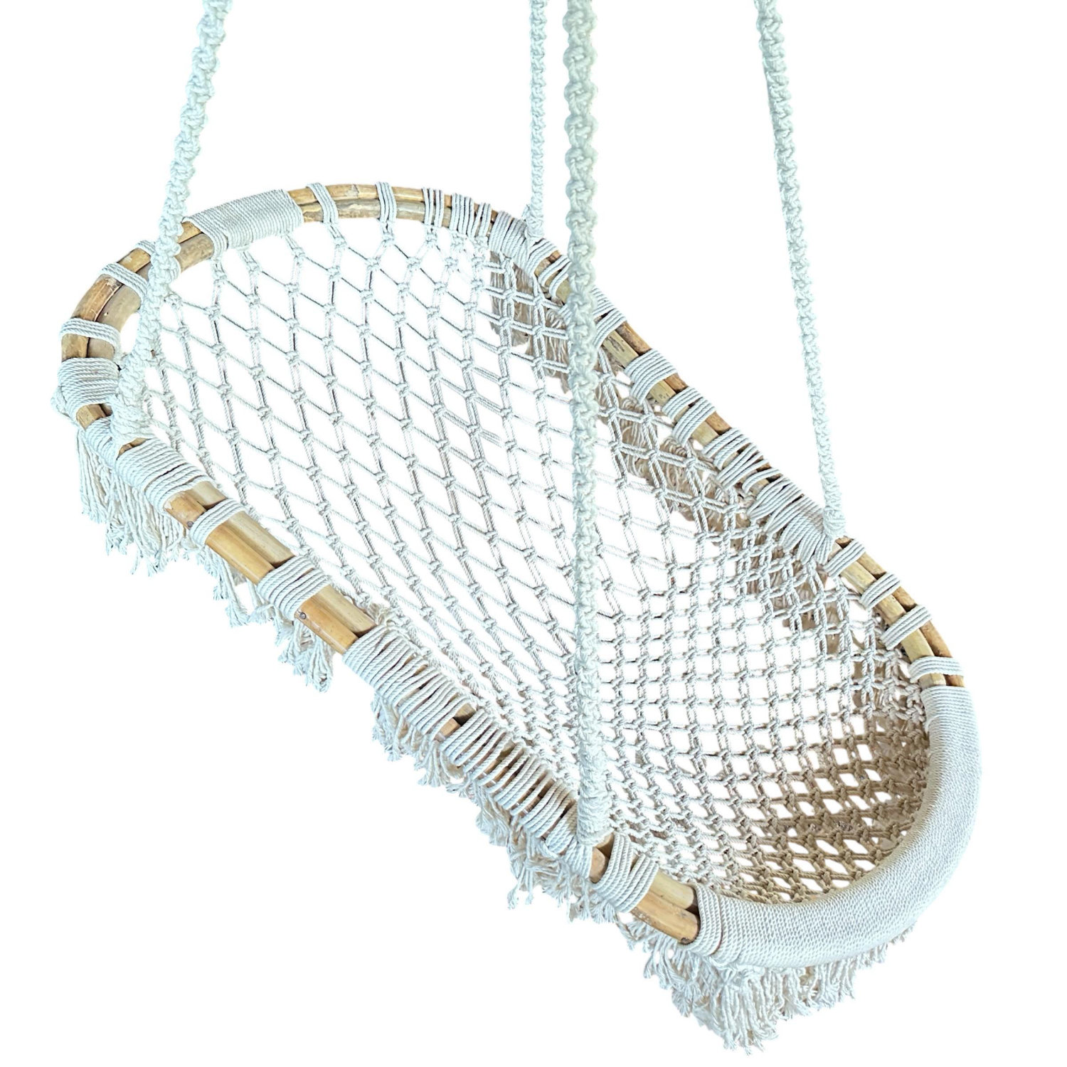 Macro detail of cotton macramé knot work pattern showing intricate hand-tied mesh of vintage bohemian hanging chair